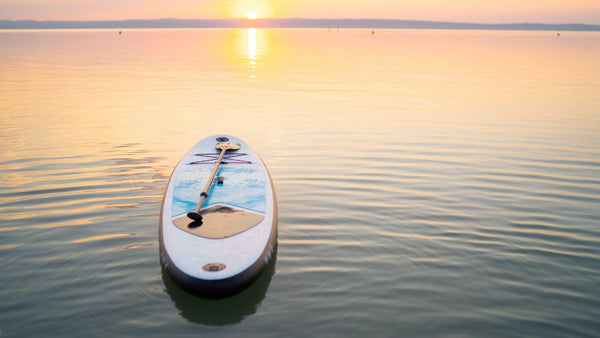 Paddleboarding: A Perfect Way to Stay Active, Centered & Outdoors This Season - TRAPSKI, LLC