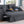 Cody II - Convertible Sleeper Loveseat With Cup Holder, Charging Ports and Pocket - Dark Gray