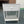 Modern White Nightstand with Drawer and Open Shelf