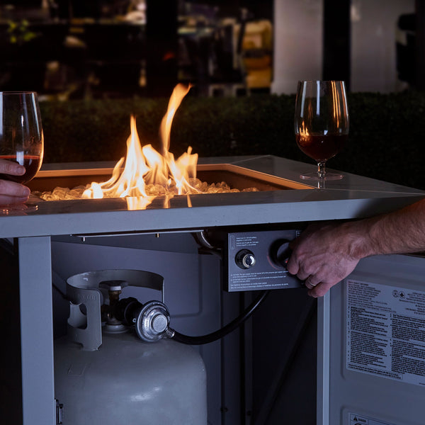 Endless Summer Outdoor Fire Pit Table with Faux Marble Finish, White Glass