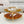 Luxurious Round Coffee Table with Gold-Tinted Tempered Glass Top