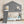 Twin House Bunk Bed with Slide and Storage Shelves