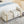 Elegant Upholstered Storage Bench With Cylindrical Arms And Iron Legs,