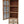 Rustic Wooden Storage Cabinet with Decorative Cutout Door
