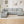 Upholstered U-Shaped Sectional Sofa With Movable Ottoman And Side Storage Pockets