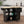 Kitchen Island with Spice Rack, Towel Rack and Extensible Solid Wood Top - Black