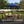 Four Seasons Courtyard 9 Foot Crank Lift Auto Tilt System Patio Umbrella, Navy - TRAPSKI