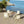 4 Piece Set Of Modern Color Block Designed Single Chairs With Folding Square Table