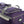 Olympia 33 Inch 8 Pocket U Shape Rolling Duffel Bag with Handle, Dark Lavender