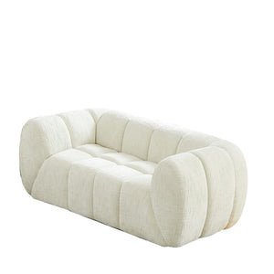 Quilted Cloud Sofa With Rounded Armrests And Piano Key Backrest Design