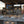KoKoMo Bermuda Kitchen BBQ Island with Built-In TV, Fire Pit & Bar for Ultimate Outdoor Entertaining