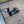 Camco Motorcycle Wheel Chock Mount with Handlebar Straps & Universal Tire Fit