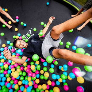 JumpFlex HERO 12' Trampoline for Kids Outdoor Play Equipment with Net & Ladder