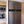 Camco Adjustable Universal RV Fridge Door Block Accessory with Drawstring, Blue