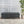 Glouster Contemporary Storage Ottoman with Button Tufted Design