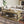 55.1' Wood Coffee Table with Black Legs and Open Storage Shelves