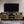 Ensata II - TV Stand - Rustic Oak / Black