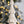 Fringes Embellished Cone With Wooden Base