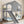 Twin House Bunk Bed with Slide and Storage Shelves