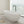 67 in. x 31 in. Oval Freestanding Solid Surface Soaking Bathtub with Center Drain in Matte
