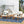 3 Piece Outdoor Chat Set With Table And 2 Adirondack Chairs - White / Brown Patina