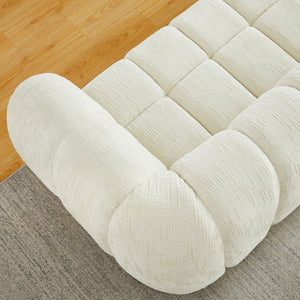 Quilted Cloud Sofa With Rounded Armrests And Piano Key Backrest Design