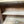 Rustic Vintage Accent Cabinet with Carved Floral Panels