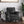 Contemporary Black PU Club Chair with Nailhead Trim and Rolled Armrests
