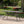 Enchantia Outdoor Rectangular Dining Table with Weave Tabletop and Flared Legs - Copper