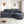 Modern L-Shaped Sectional Sofa With Curved Chaise, USB Ports, And Side Storage Pockets