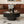 Round Coffee Table Handcrafted Relief Sturdy Pedestal