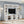 All-In-One TV Stand With Bookcase For TVs Up To 70