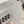2 Door Wine Bar Cabinet With Adjustable Shelf, Soft-Closing Hinges, And High Feet - White