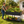 Dual Tier Elevated Metal Raised Garden Bed with Lockable Wheels & Lower Storage Shelf