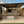 KoKoMo Bermuda Kitchen BBQ Island with Built-In TV, Fire Pit & Bar for Ultimate Outdoor Entertaining