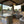 KoKoMo Bermuda Kitchen BBQ Island with Built-In TV, Fire Pit & Bar for Ultimate Outdoor Entertaining