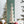 Fringes Embellished Cone With Wooden Base