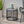 Achill Outdoor Modern Boho Wicker Side Table With Glass Top - Gray