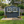 6x9 FT Outdoor Metal Storage Shed with Window & Flower Rack