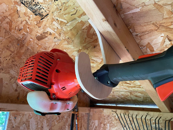 Ceiling Weed Wacker Organizer, hangs from ceiling rafters in shed, easy to install, fits all weed wackers - TRAPSKI, LLC