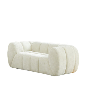 Quilted Cloud Sofa With Rounded Armrests And Piano Key Backrest Design