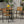Vermilion Outdoor Dining Chair With Vertical Slat And Wooden Arm