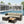 L-Shaped Patio Set With Cushions And Storage Table