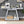 Modern Luxe Full Body Mirror Entryway Table With Trapezoid Base, 360° Reflective Console, Scratch Resistant, Open Storage - Silver