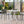 4 Modern Stackable Plastic Armchair Matched With Round Table