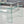 Modern Tempered Glass Coffee Table With 2 Tier Storage For Living Room