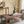 Rustic Brown Wood Coffee Table with Turned Spiral Legs and Lower Shelf