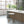 Backless Upholstered Counter Stool With Padded Seat - Ivory / Bronze