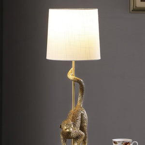 24-Inch Old World Gold Capuchin Monkey Table Lamp with Cotton/Linen Shade - Golden White