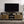 Ensata II - TV Stand - Rustic Oak / Black